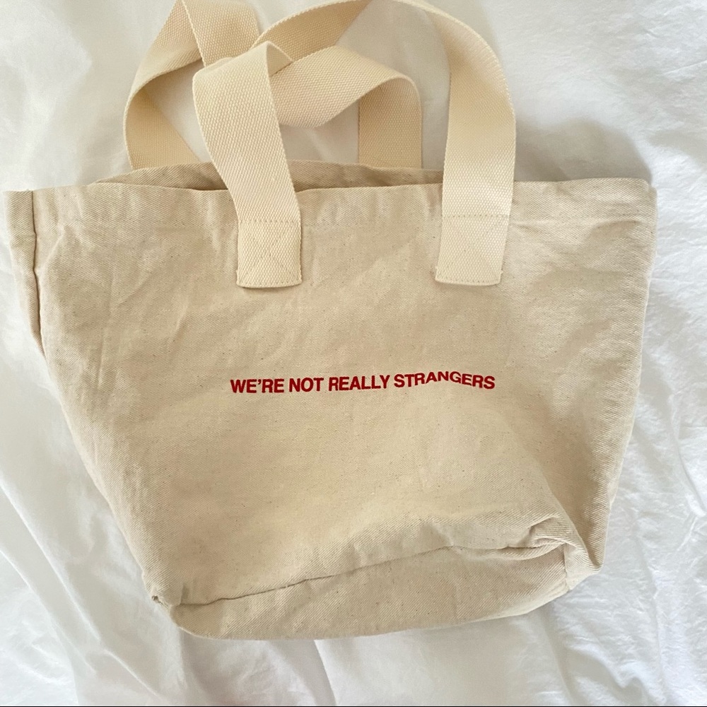 We’re Not Really Strangers Tote Bag